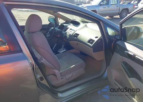 2006 Honda Civic Hybrid from USA, damaged, VIN JHMFA36276S012935